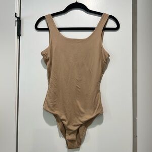 Pink lily tan bodysuit